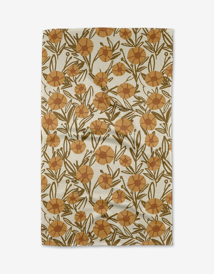 Floral patterned towel with brown flowers on a beige background
