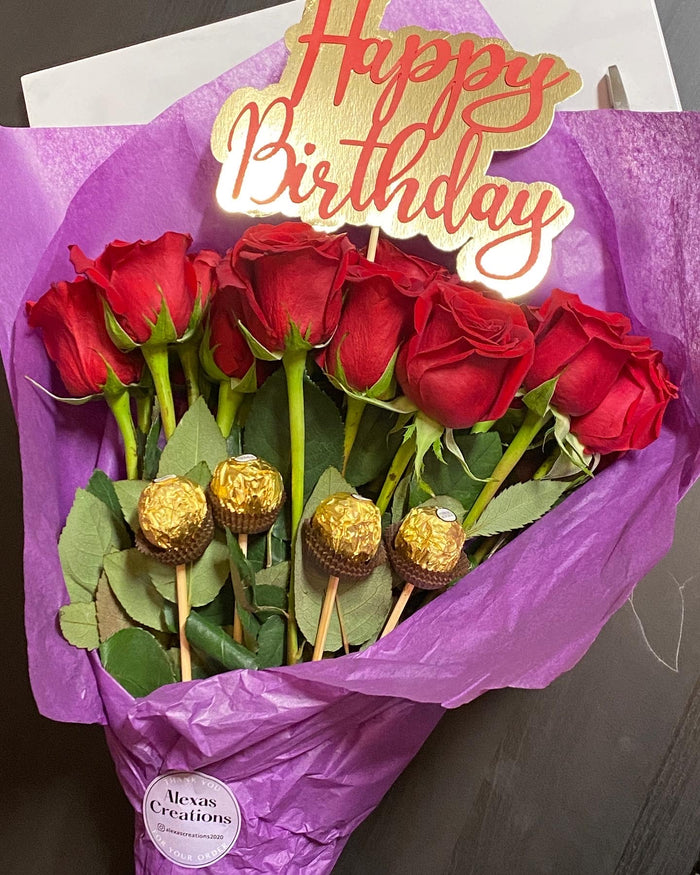 Red roses with custom topper